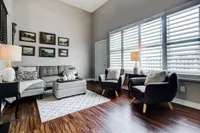 Living room with 12-foot cathedral ceiling and gallery wall