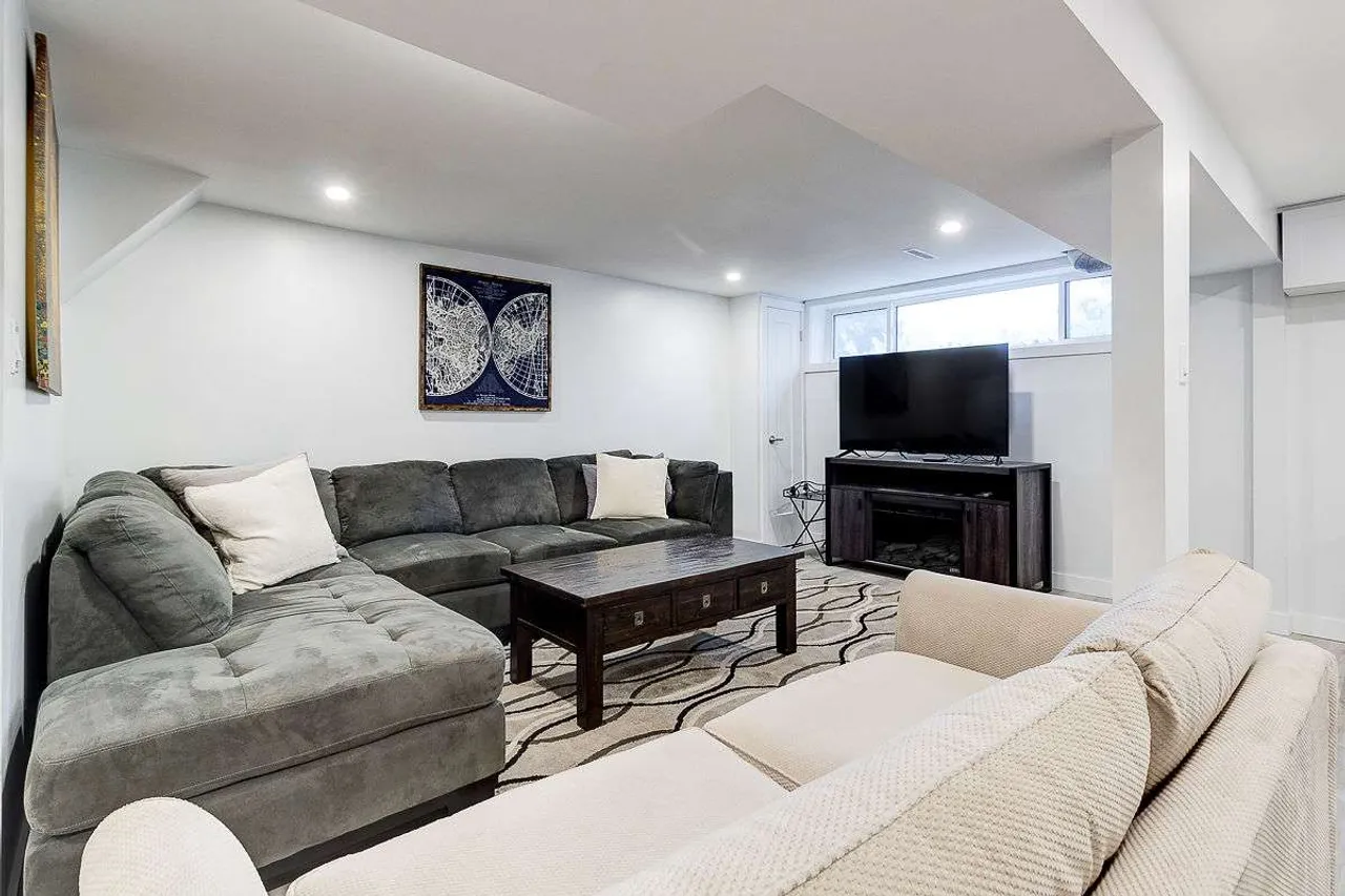 In-law suite basement kitchen with separate dining area