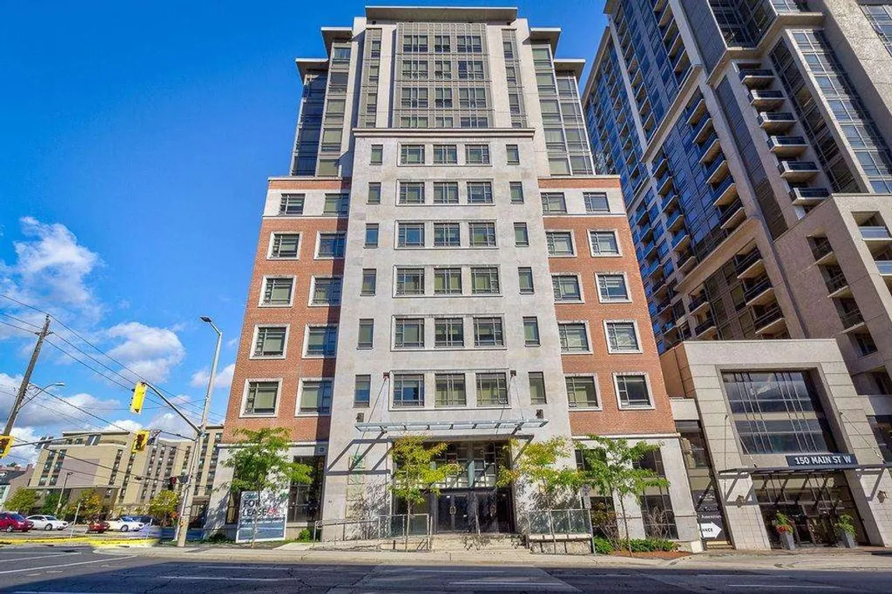 High-rise condo building exterior on Main Street West near Hess Village
