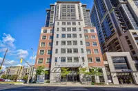 High-rise condo building exterior on Main Street West near Hess Village
