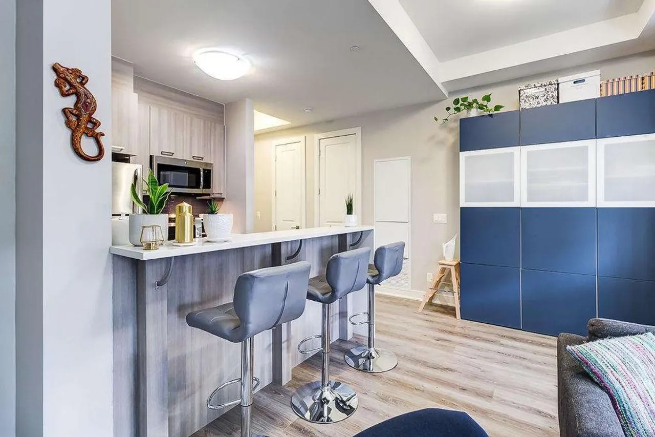 Kitchen breakfast bar with stainless steel appliances