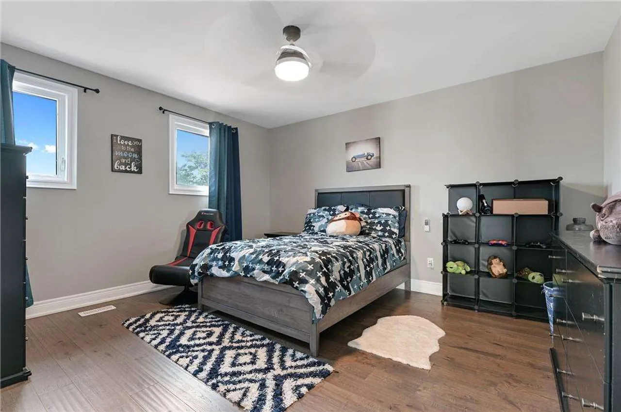 Bedroom with a navy and grey colour scheme
